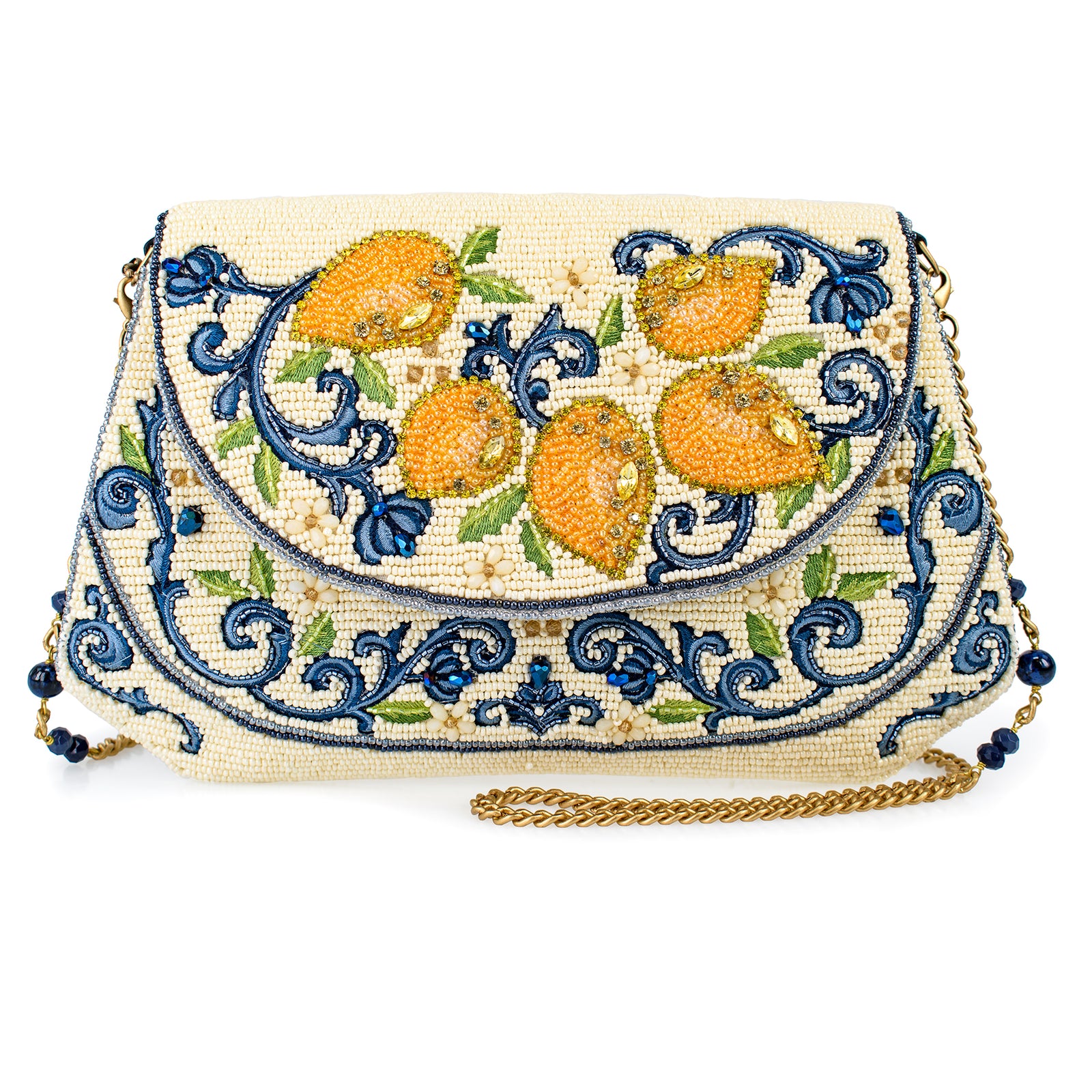 This delightfully decorated 'Capril Lemons’ purse captures the essence of an Italian summer getaway with its sunny yellow lemons and rich blue scrollwork. The purse is fully beaded, front and back, by hand—no two pieces are exactly the same—and is accented with diamante stones for a subtle sparkle. This is the perfect accent piece for any summer event outfit. Hand-beaded Satin lined with an interior slip-pocket Detachable satin-gold metal and beaded chain shoulder strap included Vegan Dimensions: 10" x 7" x