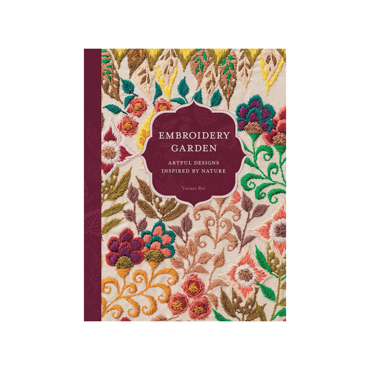 Book cover with embroidered floral designs and text 'Embroidery Garden' on a white background