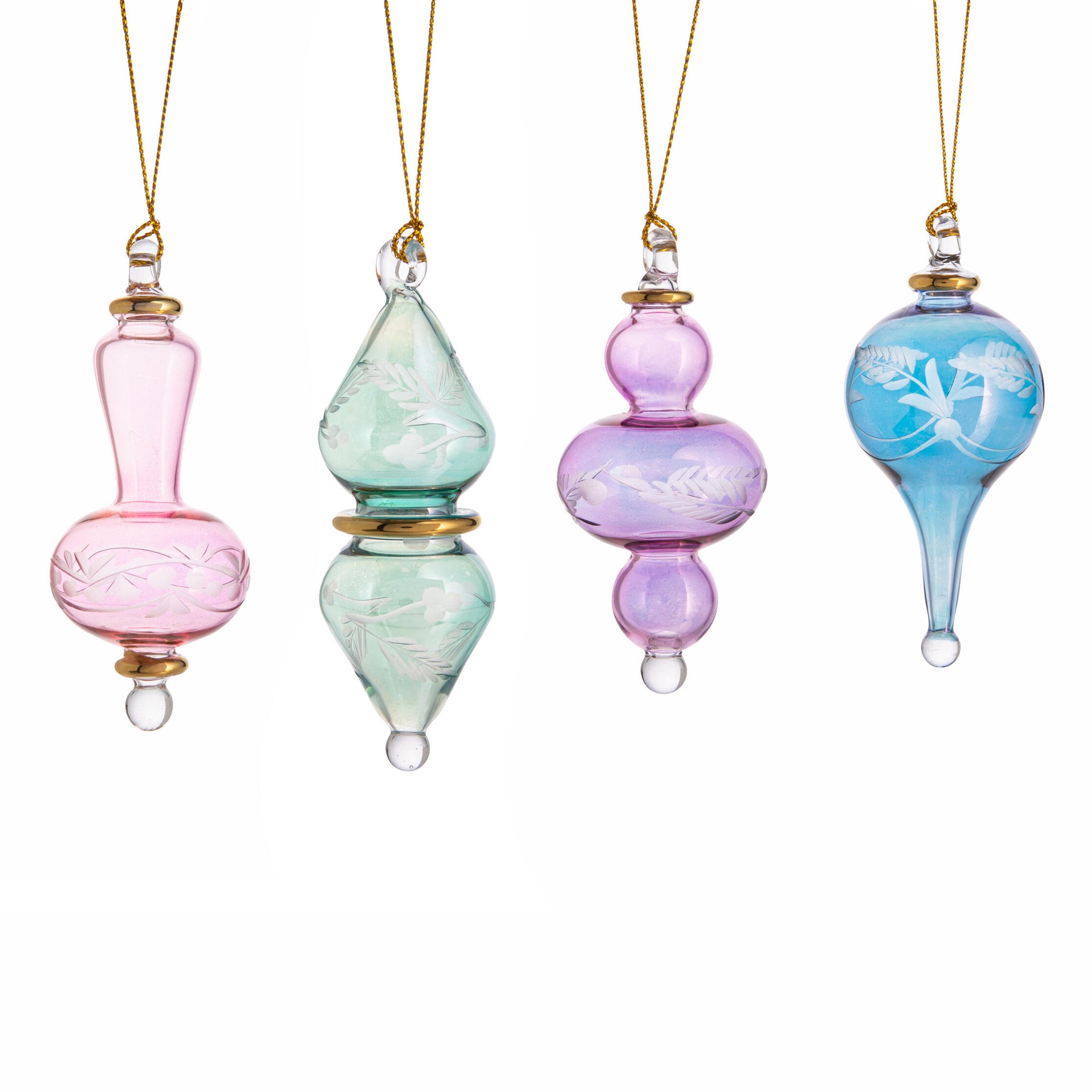 Set of four colorful glass ornaments on a white background