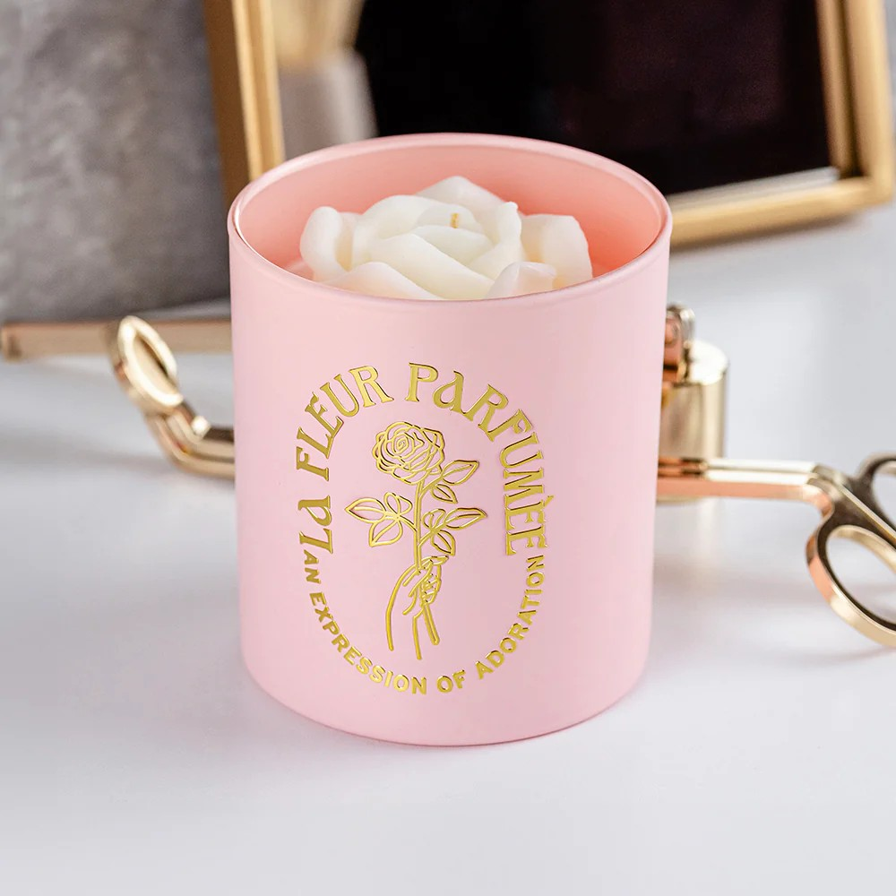 Experience luxury with our scented soy candle, featuring a sculpted wax rose. Non-toxic, vegan, with a 60+ hour burn time. Perfect for any occasion!