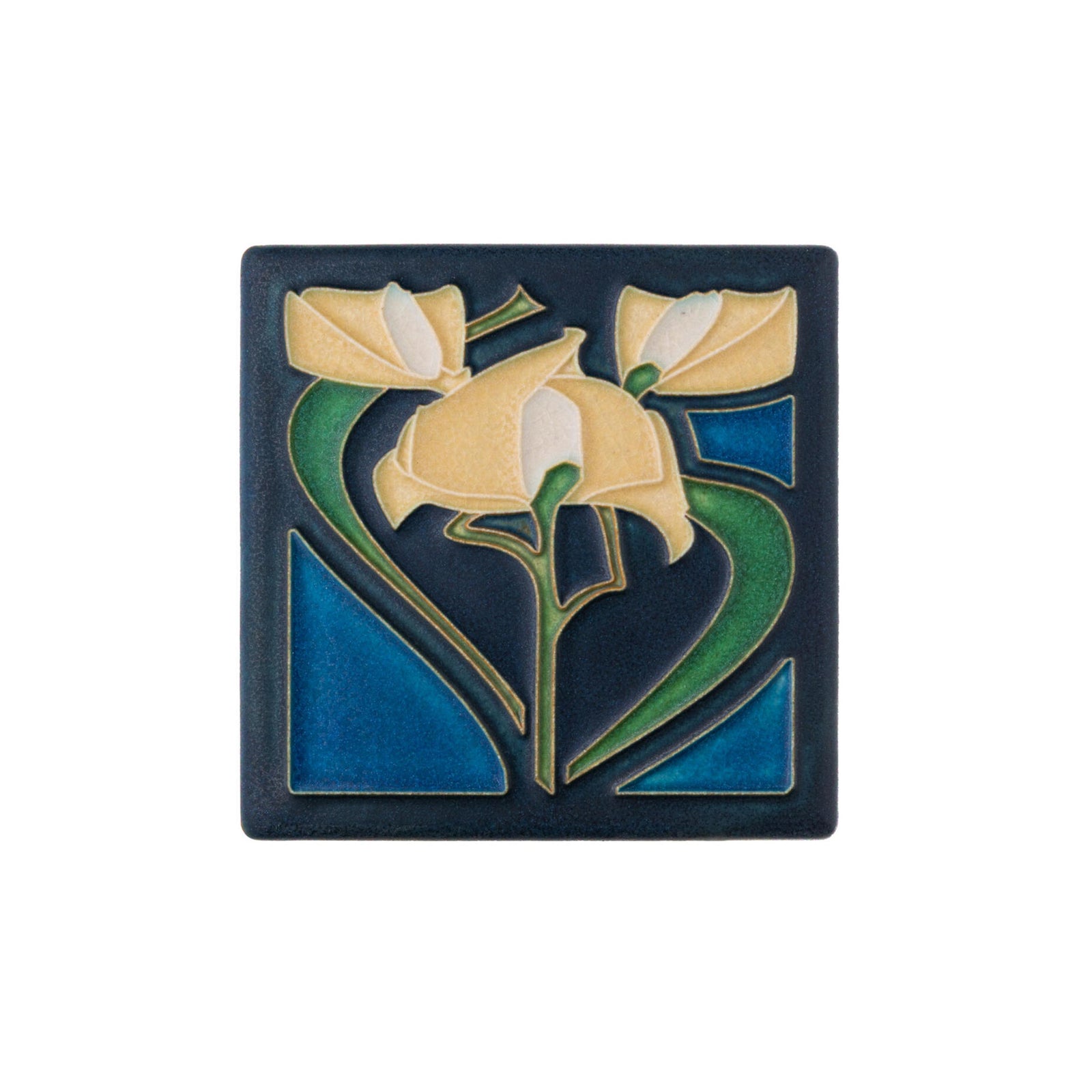 This delightful Motawi Tileworks tile depicts a fragrant freesia bloom with a deep indigo background, rendered in a classic Arts & Crafts style.