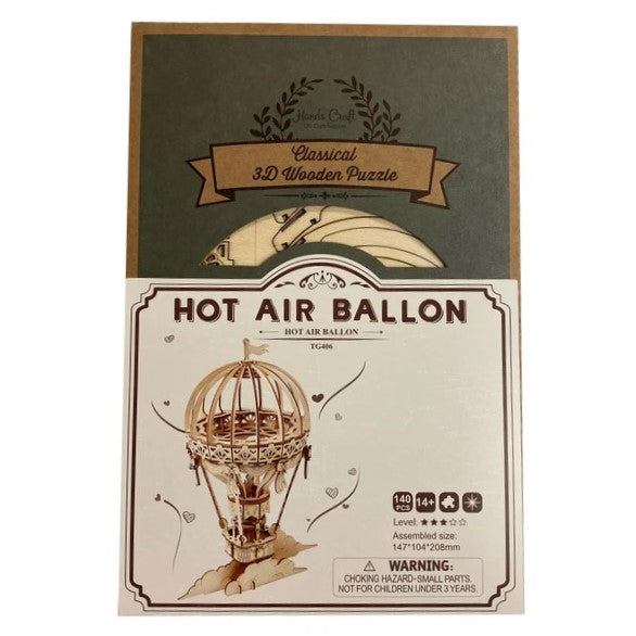 Wooden model of a hot air balloon on a white background