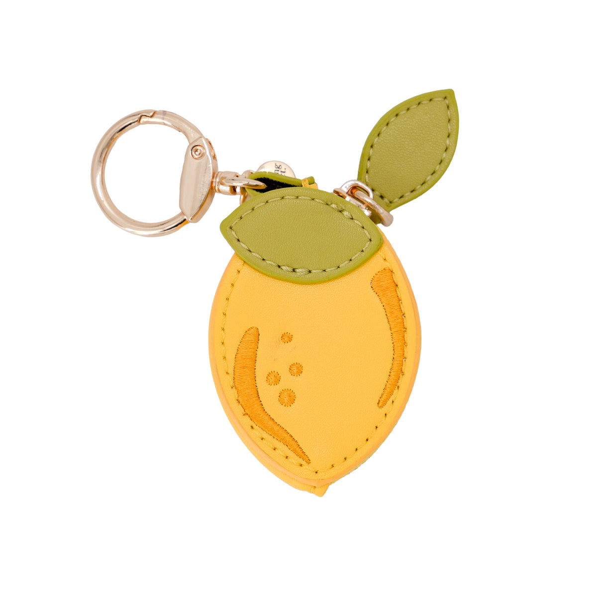 Lemon-shaped keychain with a gold ring on a white background