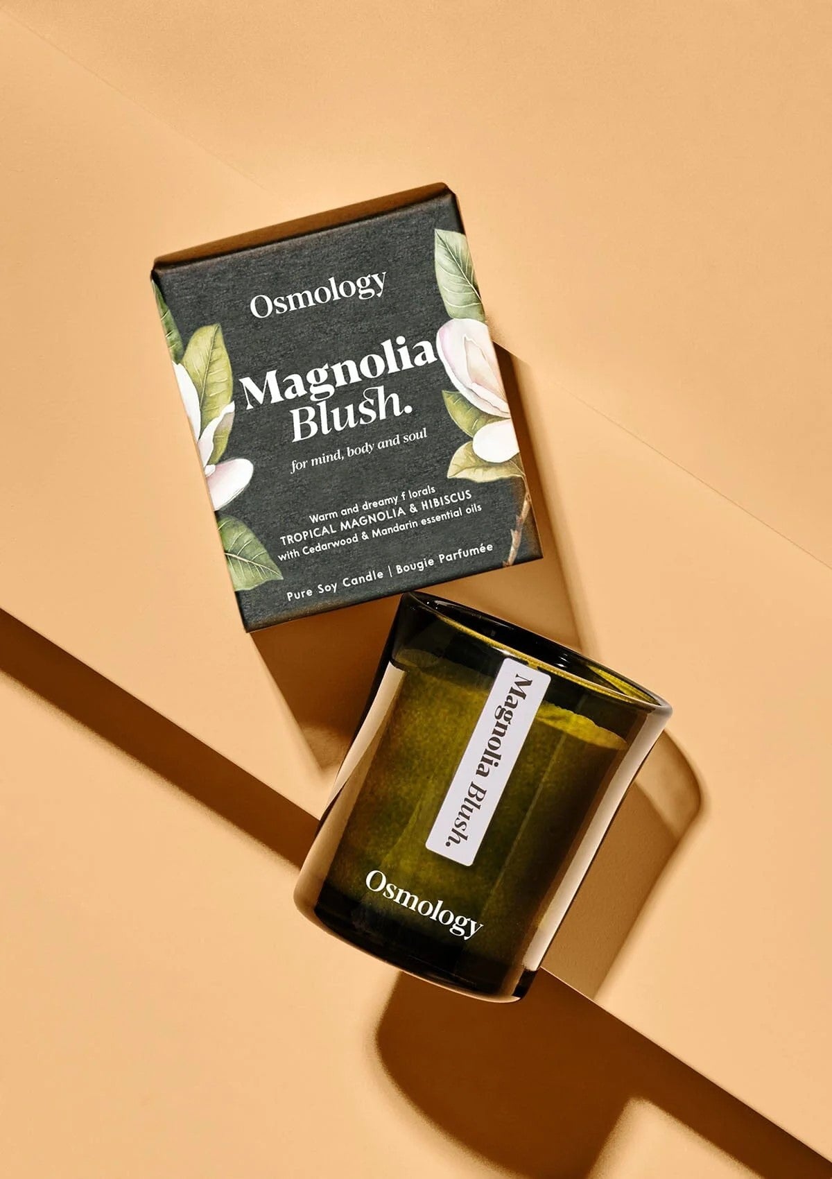 Revitalize your space with Magnolia Blush Candle! Experience the uplifting notes of Magnolia, Hibiscus, Cedarwood, and Mandarin. Perfect for creating an atmosphere of peace and calm wherever you light it. Use in bedrooms and living rooms for an energizing effect boosted by essential oils. 