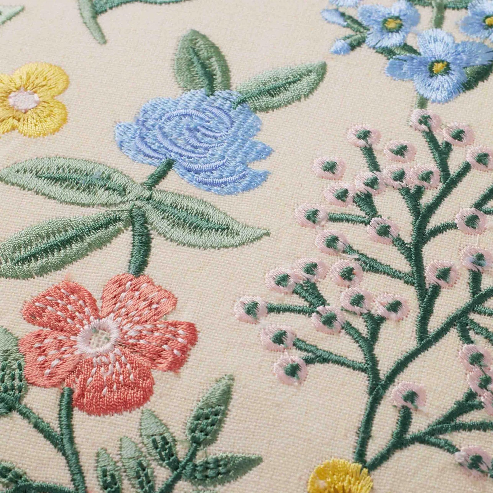 Colorful wildflowers pop on this Mayfair pillow with embroidered details and tassels. Adds natural beauty to any room. 100% cotton, 18"x18", down-filled insert.