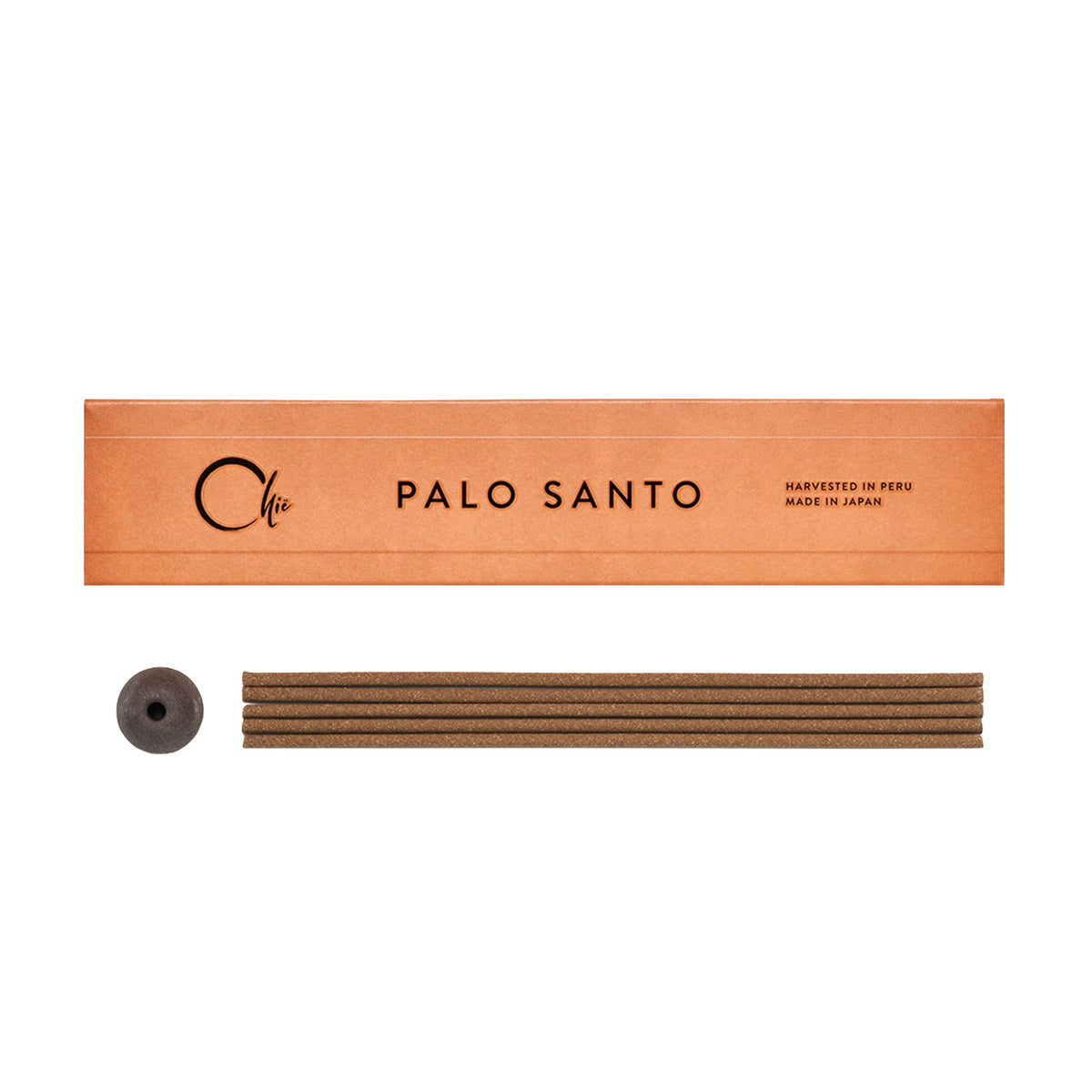 Palo Santo incense set with wooden box and sticks on a white background