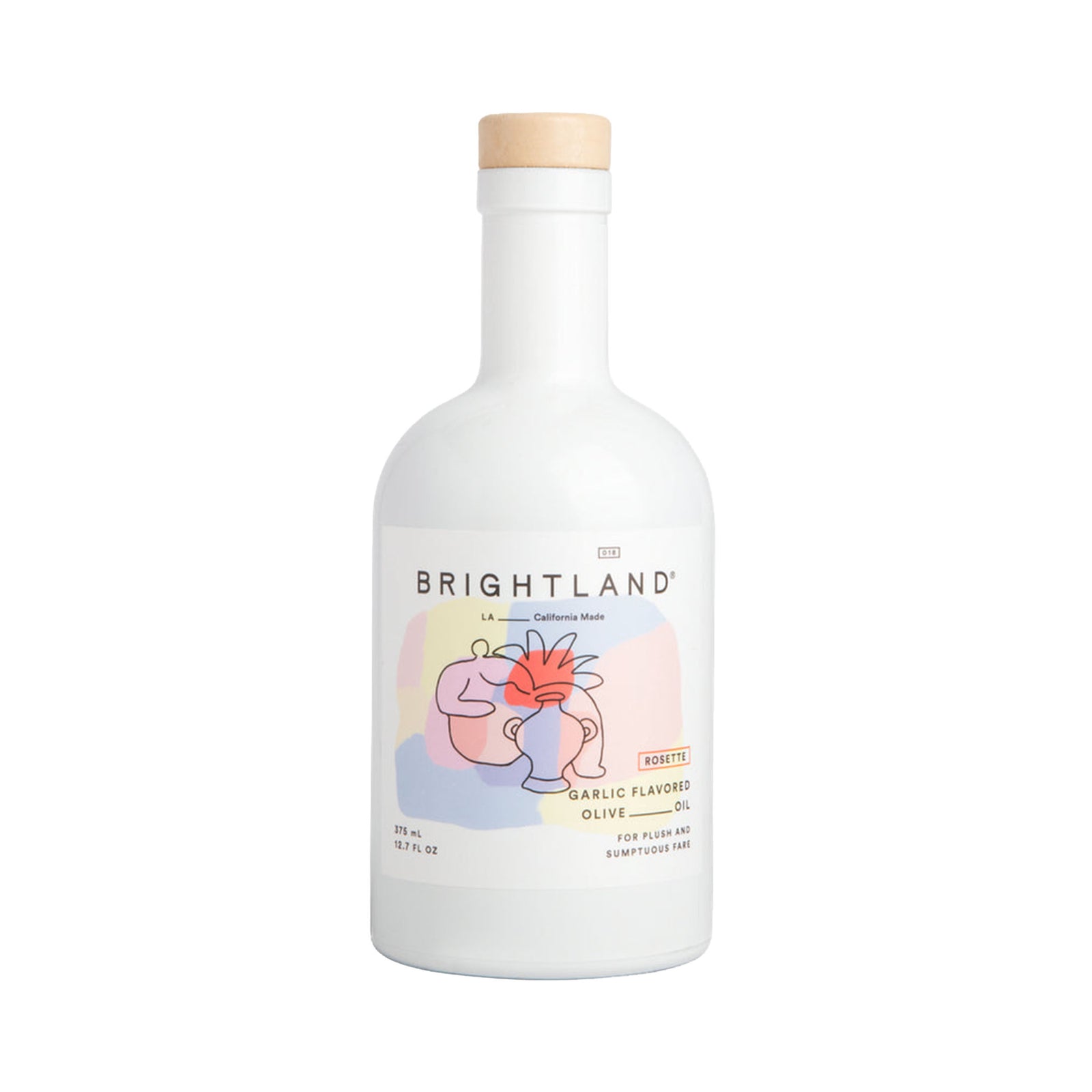 A white glass bottle of Brightland Garlic Flavored Olive Oil with a light wood cap and a colorful label featuring a stylized face illustration.