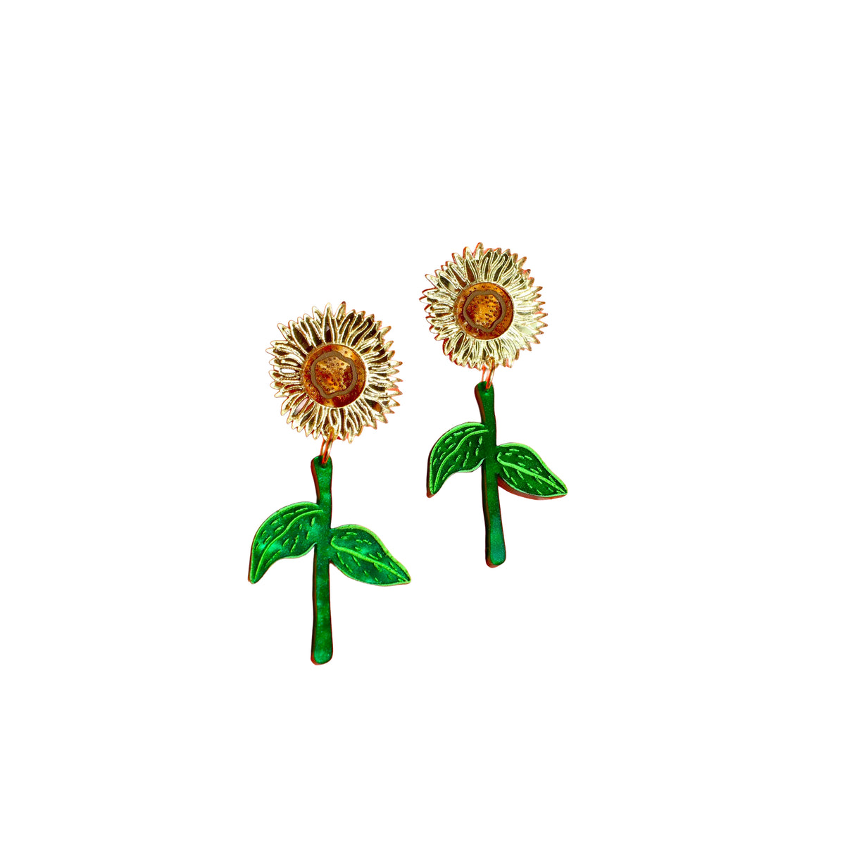 A pair of gold-tone sunflower stud earrings with green enamel stems and leaves, shown on a plain white background.