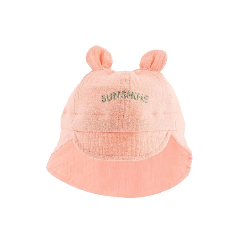 This adorable sunhat will shield your little ones from the sun's rays, adding an extra cuteness to their outfit. It is made from super-soft, cool, and breathable cotton. It features two little ears on top and the word 'sunshine' embroidered on the front. It has a little peak at the front to help shield the baby's eyes and an extended piece at the back to protect the neck.