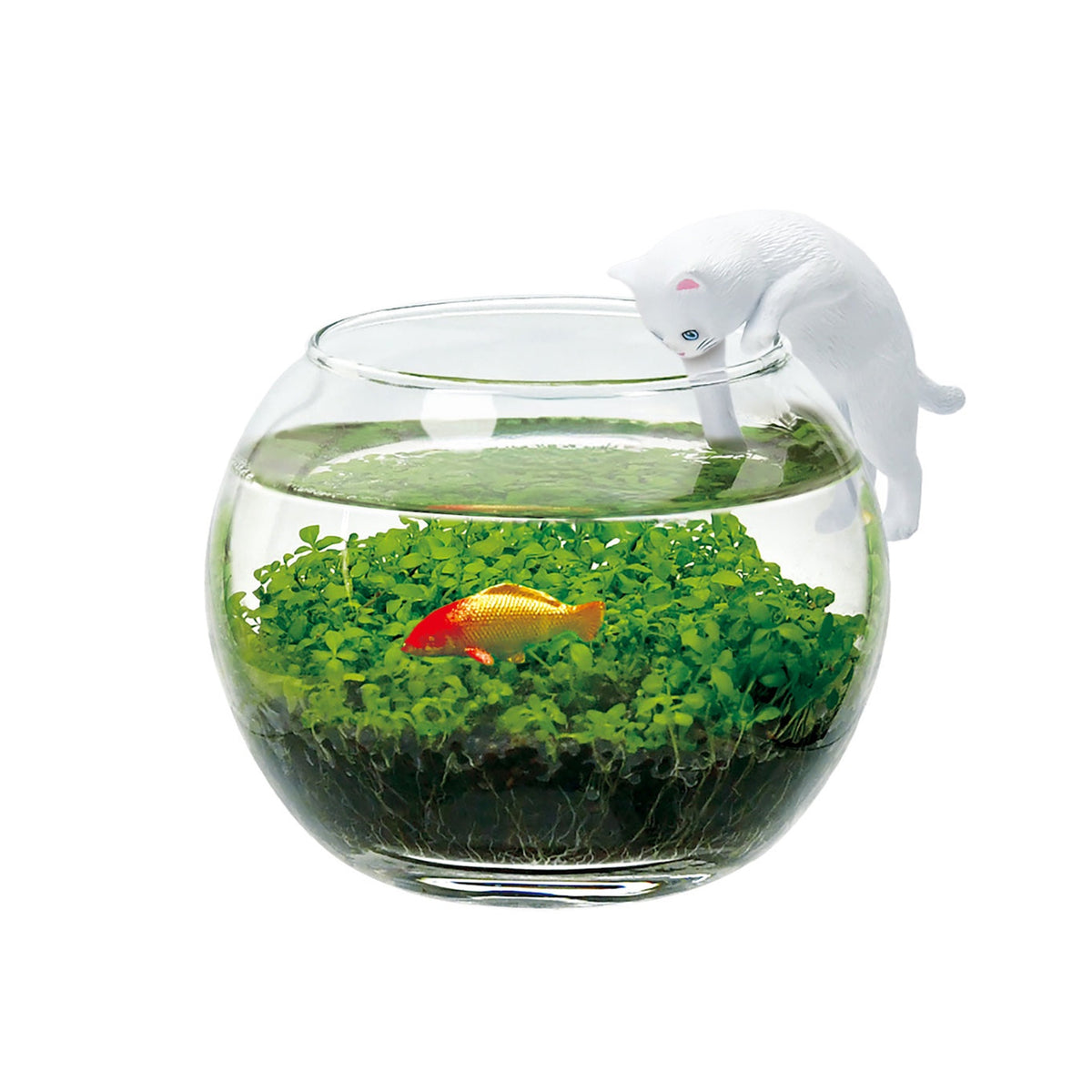A clear glass fishbowl filled with green aquatic plants and a small orange fish, with a white cat figurine leaning over the rim against a white background.