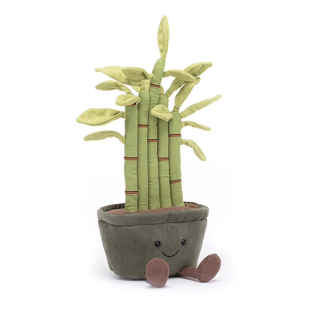 Amuseable Potted Bamboo is a stand-out star, with a hairdo of five sturdy stalks! With green linen stems, red-brown stitch details and soft suedey leaves, this perky plant sits in a snug suedey pot. With fluffy soil, rusty cordy feet and a cheery smile, it's all a-boot bamboo! Size: 12" x 5". Suitable from birth.