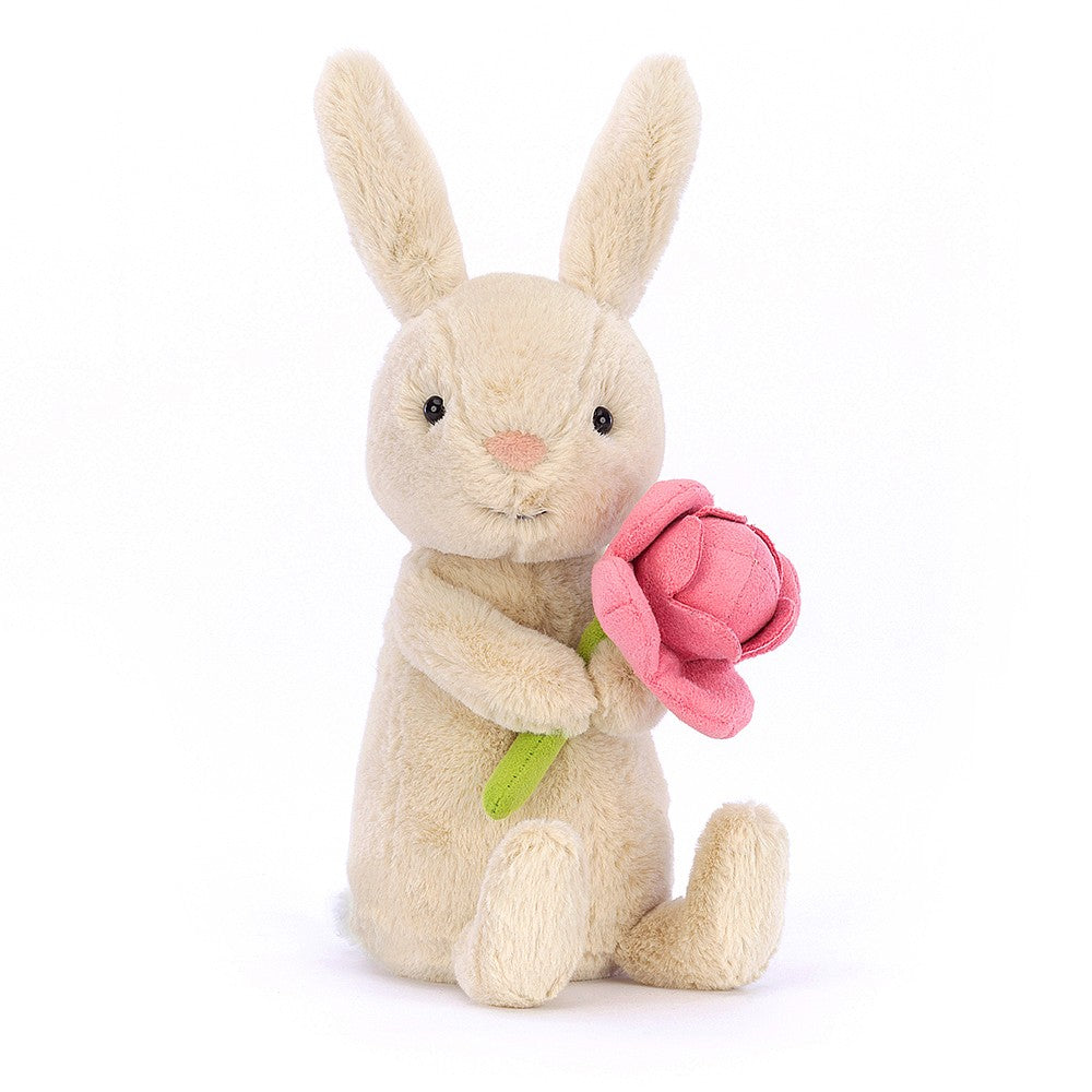 What's a nicer gift than flowers? Bonnie Bunny with Peony! This oatmeal bunny paw-delivers a super suedey layered peony - now that's pretty special! Gentle and genial, this little sweetheart picked the best flower they could find.Size: 6" x 3". Suitable from birth. Hand wash only.