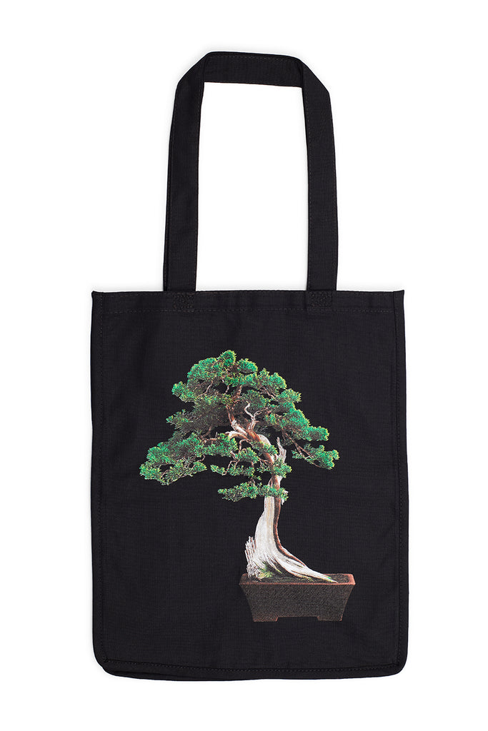 Black Tote bag featuring a stunning photograph a California juniper (Juniperus californica), bunjin bonsai, which is 500 years old. Originally collected from the Mojave Desert, it is displayed in a Tokoname pot from Japan in The Huntington Bonsai Collection. 100% cotton canvas Bag size: Width 14", Length 16", depth 7".