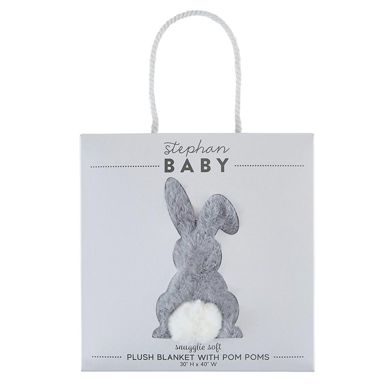 Wrap your sweet cuddle bunny in this super soft faux fur blanket. This fleece lined plush blanket is extra soft to the touch and features adorable plush pom poms on each corner. Just the right size at 30" x 40" for cold day snuggles, travel or playtime. Material: Cotton, muslin, polyester.