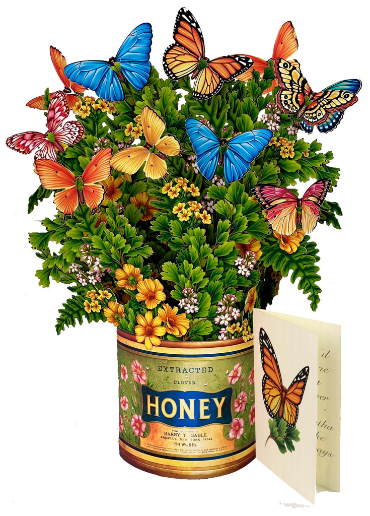Colorful butterflies, buttercups, and fern fronds. This pop-up bouquet greeting is sweet as honey! The perfect, mailable gift. Earth friendly: 100% recyclable, plus one tree is planted for each bouquet sold. Approx size: 9" x 12" Note card and envelope included Mails first class with four forever stamps.