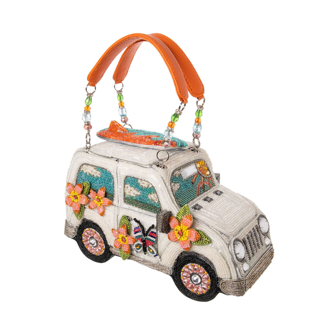 Old route 66 runs through Pasadena, right to Santa Monica Pier, and if you're planning on doing some nostalgic local sightseeing, this is the purse to take along for the ride! This little car is elaborately & luxuriously hand-beaded, right down to the surfboard on its roof rack. Size: 9 x 4 x 5.25 Strap Length:13".
