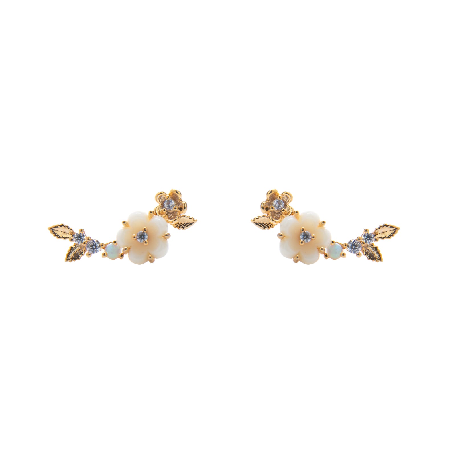 Delicate floral climber earrings by designer Tai Rittichai. Features a delicate ivory colored flower, with golden leaves, accented with teeny-tiny opals and cubic zirconia stones. Beautiful earrings which add a touch of elegant sparkle to any outfit. Sterling silver,14k gold plated post earring. Length approx 1/2 inch.