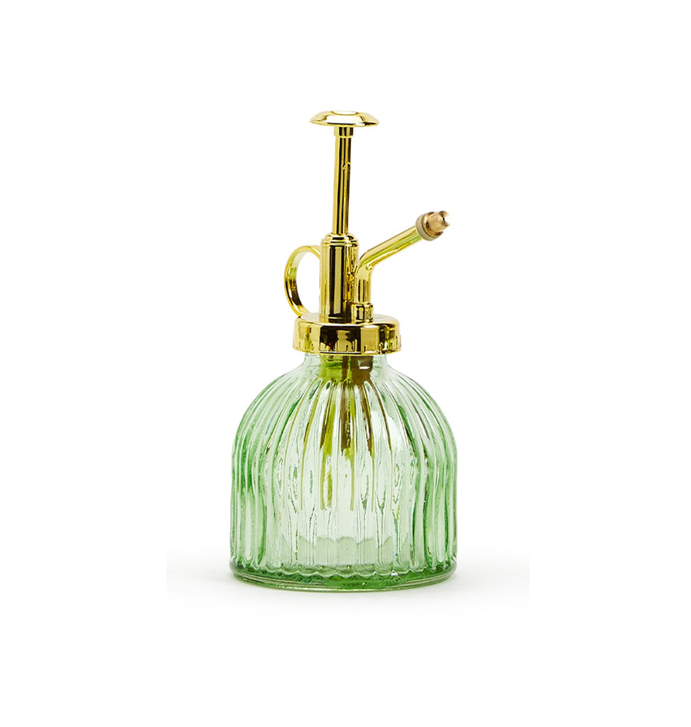 Keep your plants always looking fresh with this Art Deco style plant mister. Made of light green tinted clear glass with a gold plastic pump making it easy to evaluate water levels. Green glass with gold plastic pump Holds 8 oz Gentle mist spray 6" H x 3 1/2" Dia.