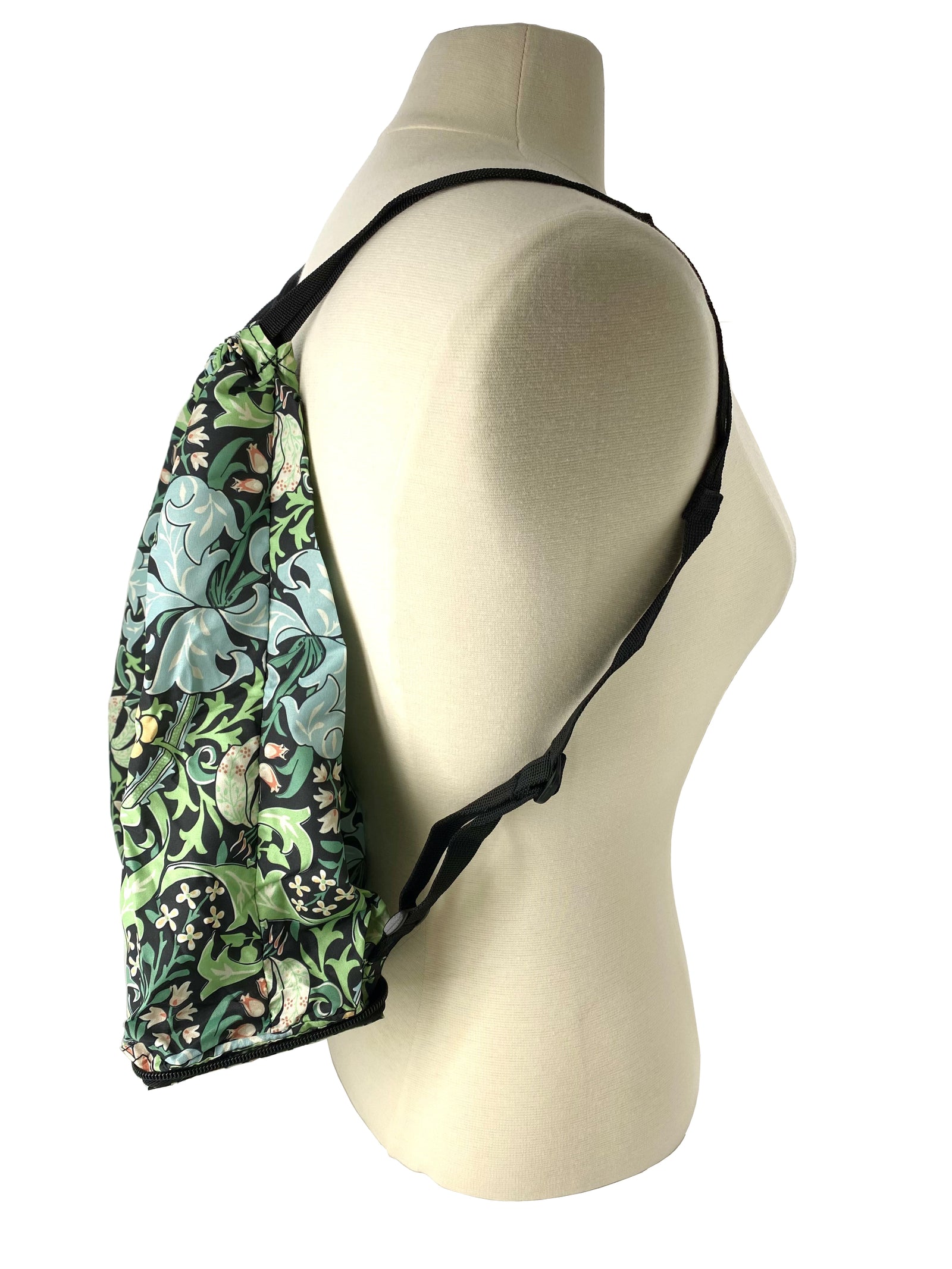 A beautifully designed backpack custom made for The Huntington based on William Morris's Golden Lily, held in The Huntington's Art Collections. This handy backpack folds up into a 5 x 4 ½ x 2” parcel and can be thrown into your purse when heading to the farmers market, a hike, & more. 16" x 14" x 4.5" when unpacked.