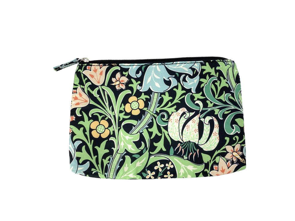 A beautifully designed cosmetic bag custom made for The Huntington based on William Morris's Golden Lily, held in The Huntington's Art Collections. William Morris, a leading figure of the Arts and Crafts movement, was known for his wonderfully patterned designs. Zipper closure 6 x 9" Splashproof polyester fabric.
