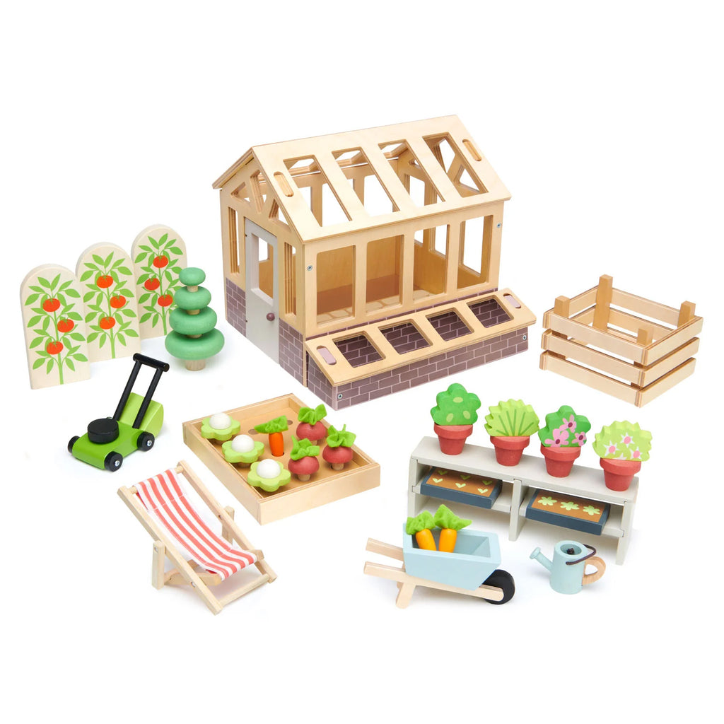 Wanting an extension for your dolls house? For children who love nature and playing in the garden, this set is ideal. A traditional plywood greenhouse with base has an opening door, and 2 removable roof panels. It can be filled with 2 seed trays, a planting bench, 4 pot plants, and 3 tomato shrubs.  Age range: 3+.
