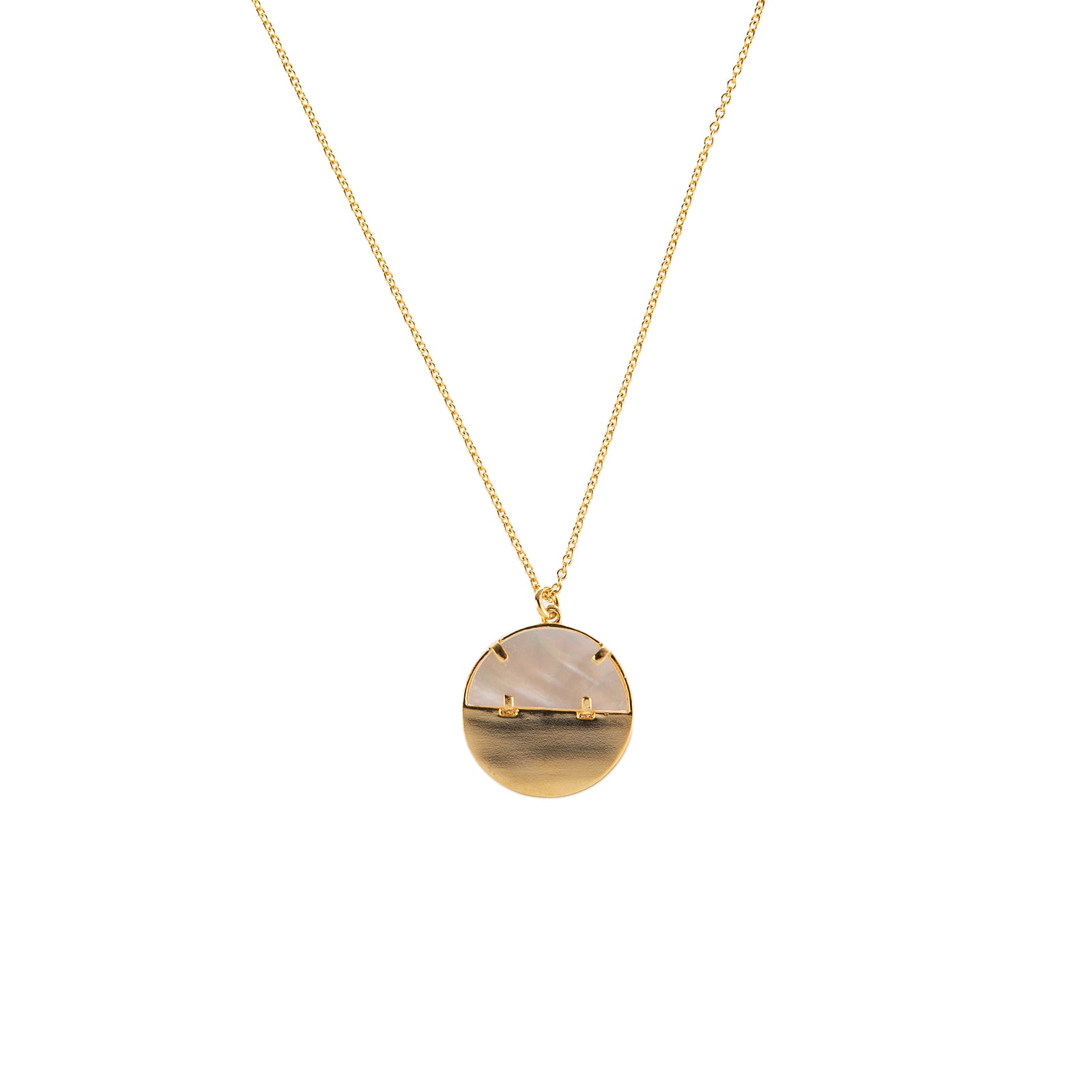 This pendant necklace features a setting sun and four twinkling stars set on a dark abalone and mother-of-pearl base. Wear this necklace as a statement piece that’s sure to attract compliments. Gold-plated brass chain Mother-of-pearl and abalone inlay Sparkling cubic zirconia accent stones 16" to 18" adjustable chain.