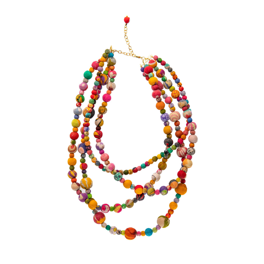 A resort-ready style, this gorgeous necklace has four strands of colorful Kantha with a varying bead mix. Necklace measures 22" long; plus a 2" extender. Sustainably handmade by women artisans in India.