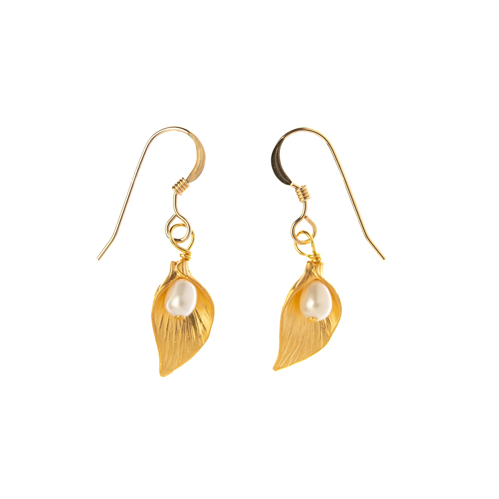 Dainty and feminine gold plated leaf earrings with freshwater pearl accents. These delicately elegant earrings are understated enough for everyday wear, yet, with the addition of genuine freshwater pearls, are glamorous enough for evening events. 14k gold plated. Gold filled earwires Freshwater pearl accents