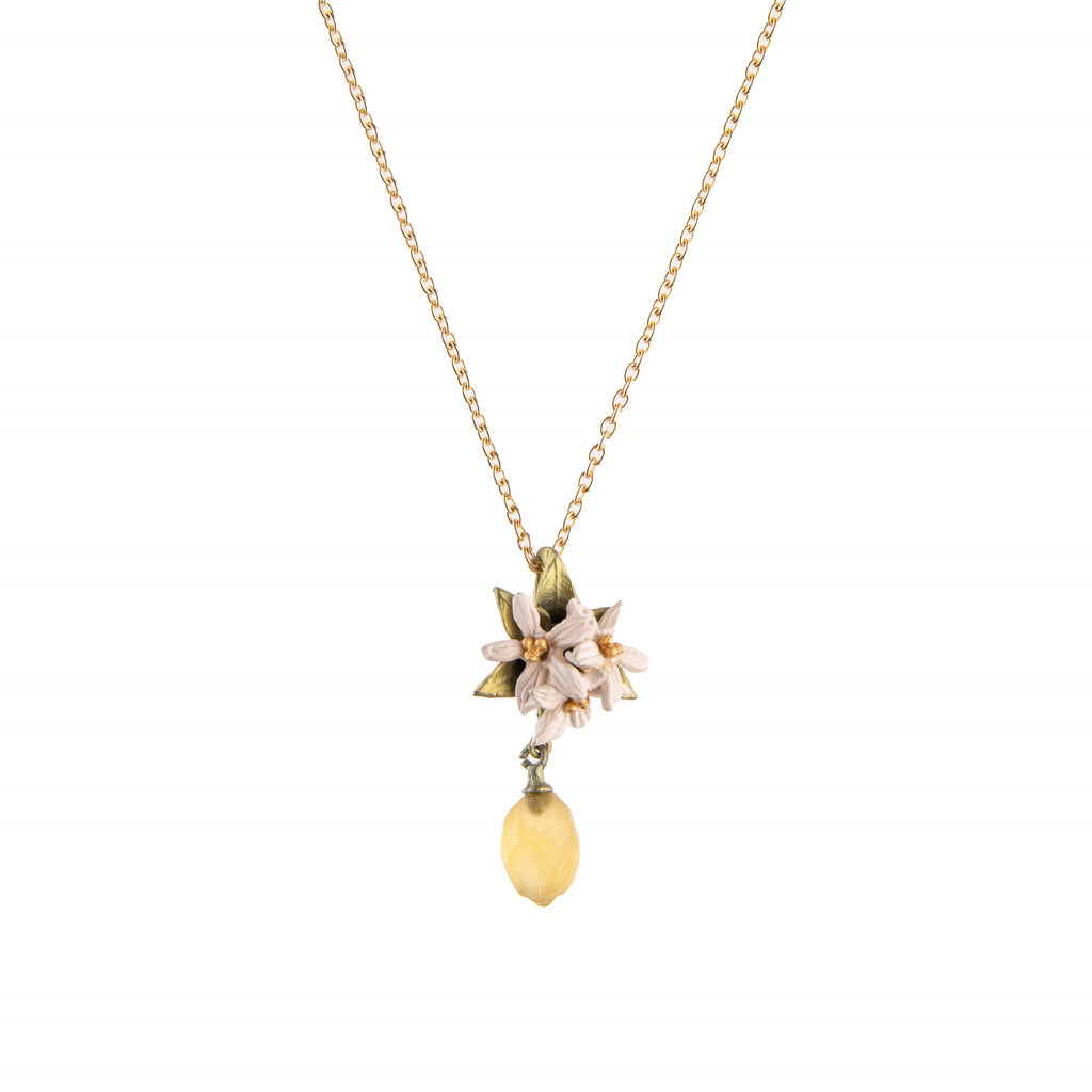 The Lemon Drop Collection was inspired by the V&A’s Green Dining Room, the world’s first museum café, and its fruit panels designed by the firm Morris, Marshall, Faulkner and Co. in 1886. This pretty lemon pendant necklace is hand-made in the USA of Bronze and hand-formed glass 16" chain Pendant length 1.2".