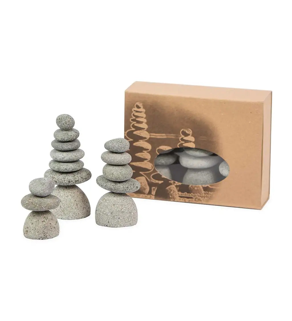 Bring the serenity of Zen cairns indoors to your workspace, desk or home with this set of three miniature Rock Cairns. Cairns have appeared all over the world since ancient times. They represent hope, safety, and guidance. Set includes three stacked cairn sculptures. 2.5"Dia x 3.25"H Fairtrade. Handcrafted in Indonesia