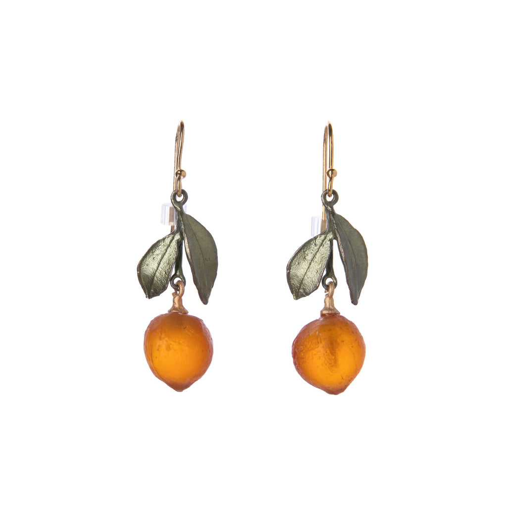 These elegant earrings feature miniature glass oranges, crafted from hand-patinated bronze and hand-formed glass with accents of gold and matte silver plate. French hook drop earrings Hand-made in the USA by Michael Michaud Bronze and hand-formed glass Earring length: 1.2" Matching necklace available.