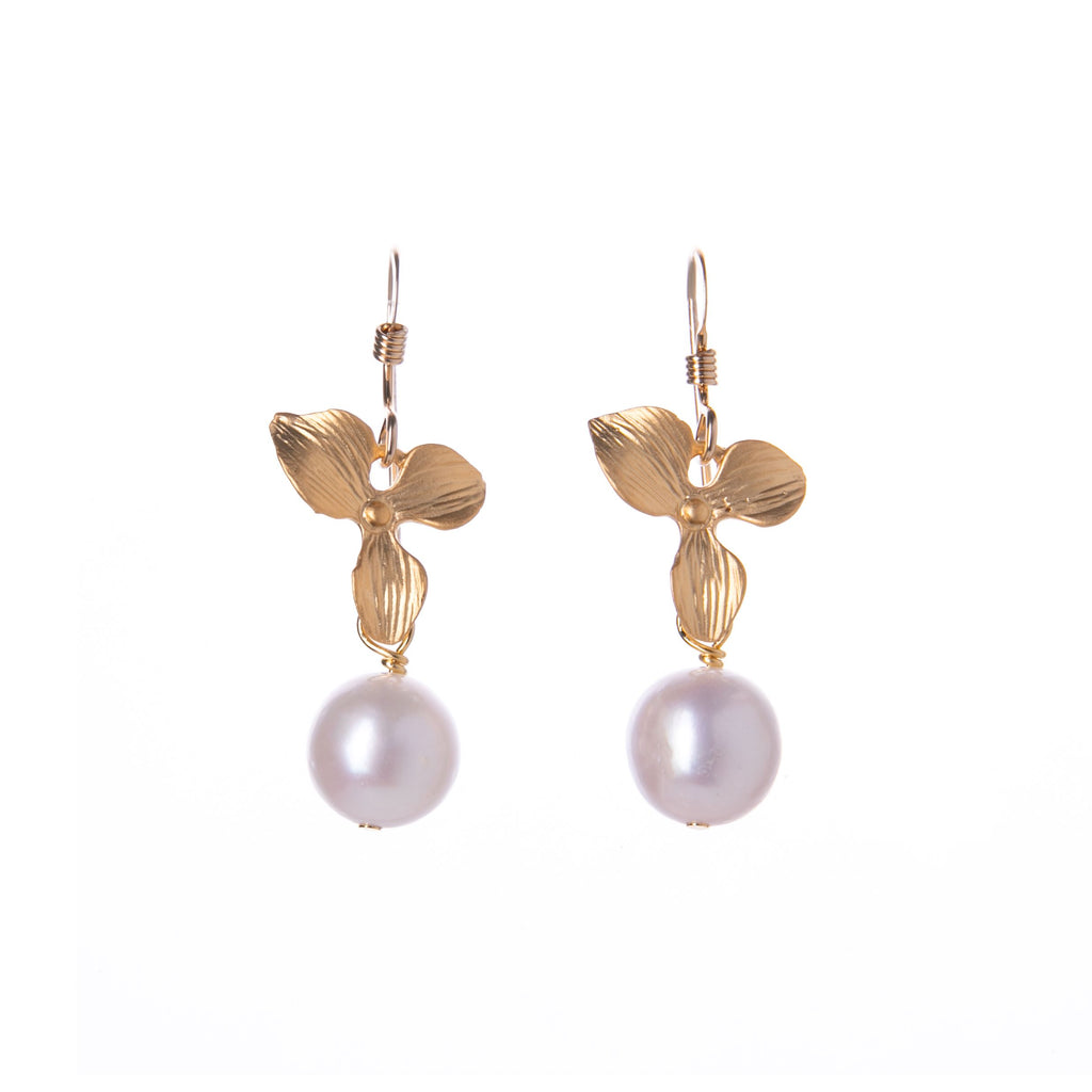 When your outfit needs just a splash of understated glamor, reach for these dainty orchid flower and freshwater pearl earrings. Handcrafted locally here in California. 14k gold dipped orchid flowers Freshwater pearl beads Gold filled earwires. Made in California.