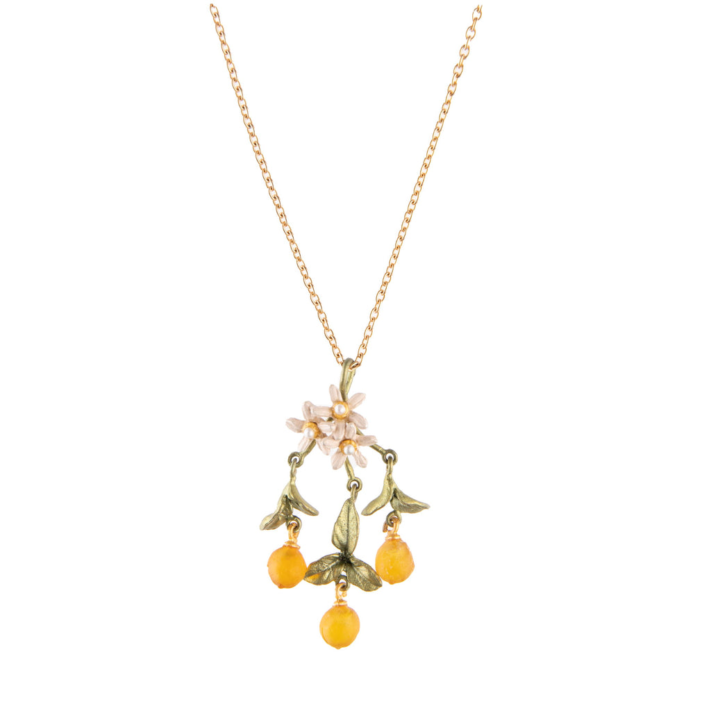 This orange blossom pendant necklace is an ode to the orange tree which explodes with heavenly scented blossom in spring, and gorgeous citrussy fruit in late summer. Hand patinated bronze, cast glass oranges, white silver flowers and freshwater pearls.1.5" x 3/4". Chain length: 16" with 2" extender. Made in the USA.