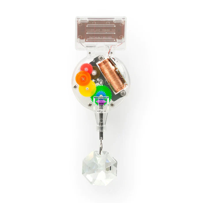 Create your own rainbow with the Solar-Powered Rainbow Maker. With Genuine Crystal! It attaches easily to your window and creates an explosion of rainbow patterns when the sun hits it. Place in direct sunlight and adjust the position as the season's change to maximize the effect. W-2" x H-5.5" x L-1.5".