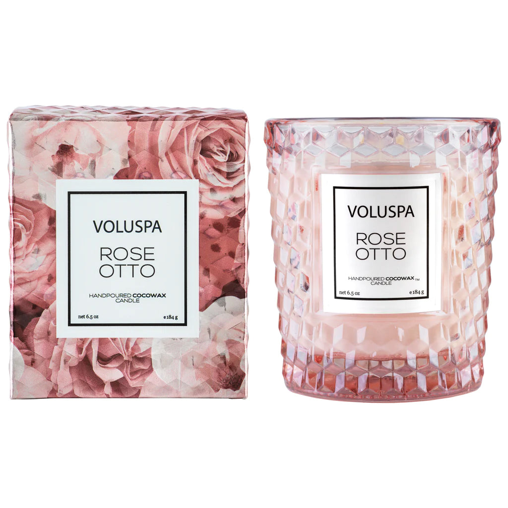 This gorgeously decadent hand-poured coco wax candle has notes of steamed distilled rosa damascena flower tops & bulgarian rose essential oil. Clean-burning coconut wax blend is hand-poured into a pink glass jar with decorative gift box. The single, 100% natural wick allows you to enjoy fragrance for 40 hours. 6.5oz.