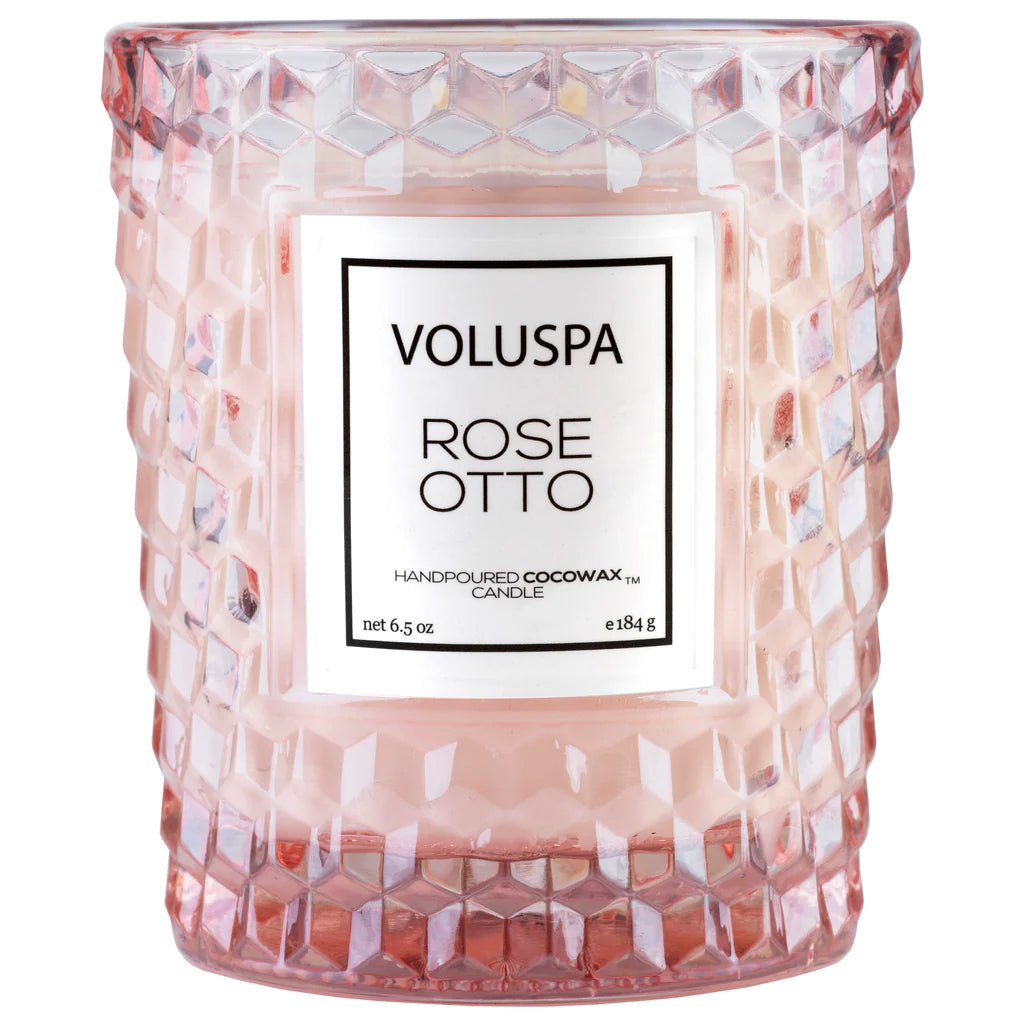 This gorgeously decadent hand-poured coco wax candle has notes of steamed distilled rosa damascena flower tops & bulgarian rose essential oil. Clean-burning coconut wax blend is hand-poured into a pink glass jar with decorative gift box. The single, 100% natural wick allows you to enjoy fragrance for 40 hours. 6.5oz.