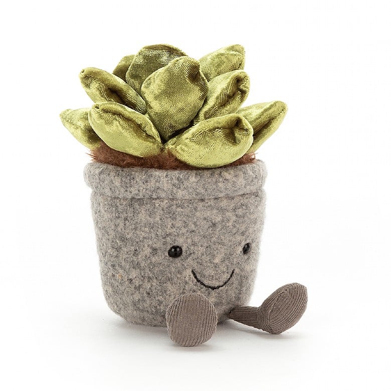 Silly Succulent Jade is a quirky plant - no water needed, just plenty of cuddles! Potted in mottled pebbly felt, with brown cordy boots and a big cheeseplant grin, this little plant has squashy velvet leaves and a peek of tufty, tawny soil! A giggly gift or a dizzy decoration! Suitable from birth. Hand wash. 6 " x 3.5"