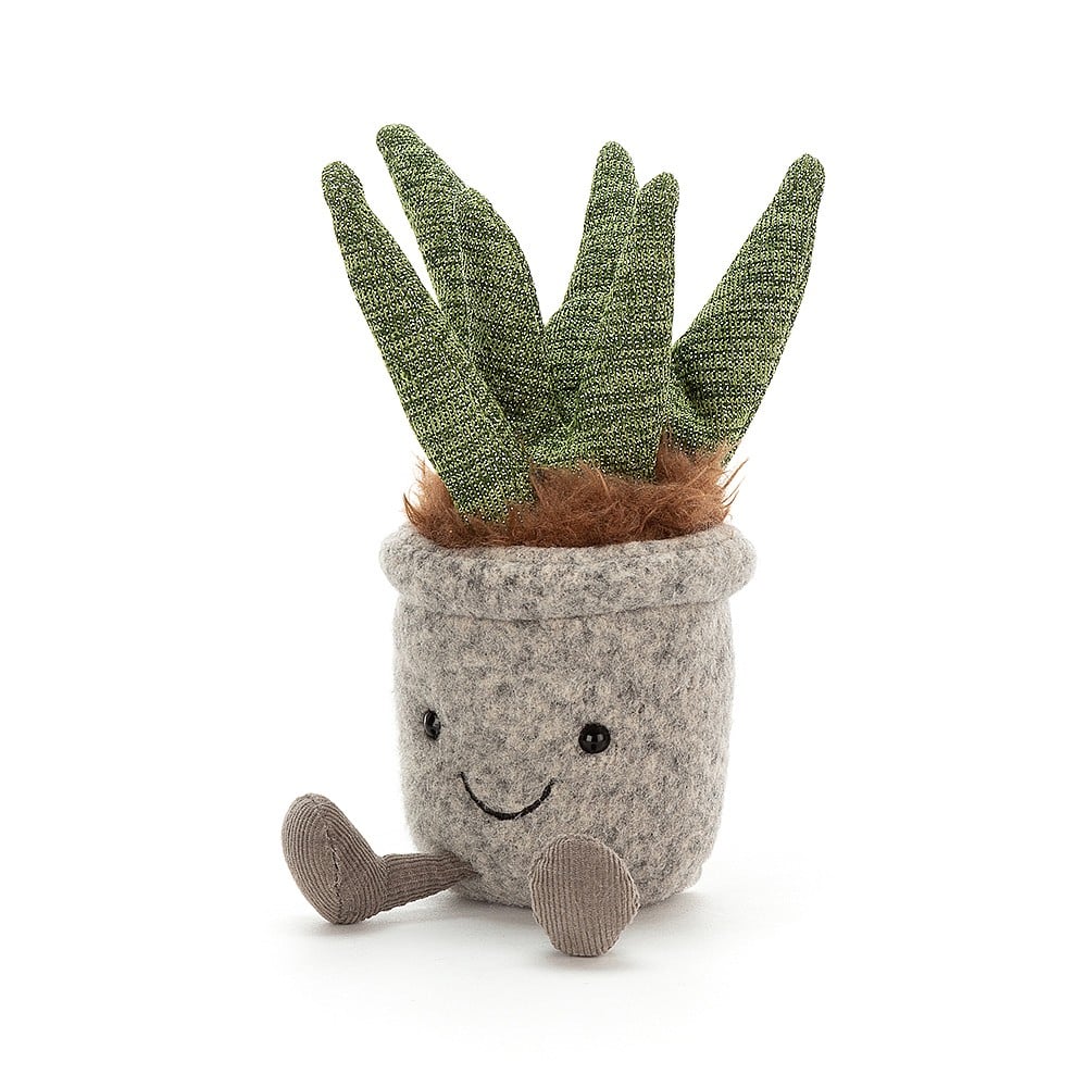 The perfect present for a cosy new home, Silly Succulent Aloe is daft and adorable. This potty plant has a grey felt pot and a great big loveable smile. A tuft of gingery fluffy soil, cordy boot-roots and sparkly jersey leaves, and you've got a soothingly silly aloe. Size: 8" x 2" Suitable from birth. Hand wash only.