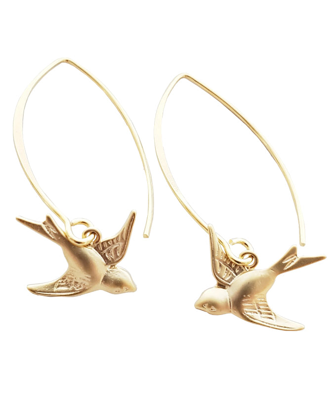 Simple and elegant. This pair of vermeil gold marquise swallow bird earrings are unique and comfortable for everyday wear. The simplistic design makes it easy to coordinate with your outfits. Vermeil gold hoops with gold plated bird charm L 1.5". W 0.5"