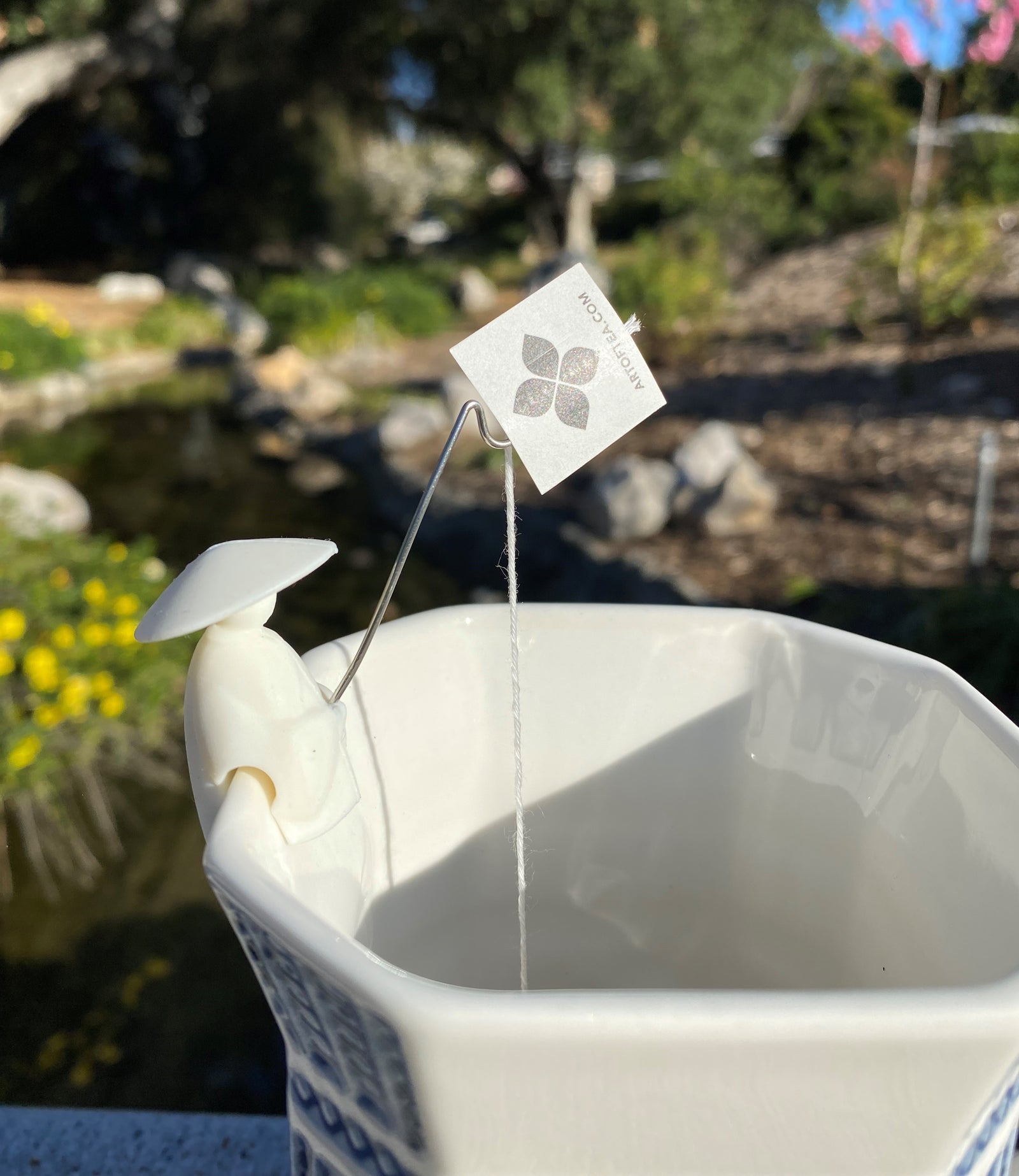 These tea holders are based on an old Chinese story of Jiang Taigong. He uses a straight fishhook because he believed that the fish will come to him when they were ready to be caught. Now he can hold your tea bag! Set of 4 fishermen. Made of silicone - attaches to your cup or mug. Each fisherman is approx 1" x 0.5".