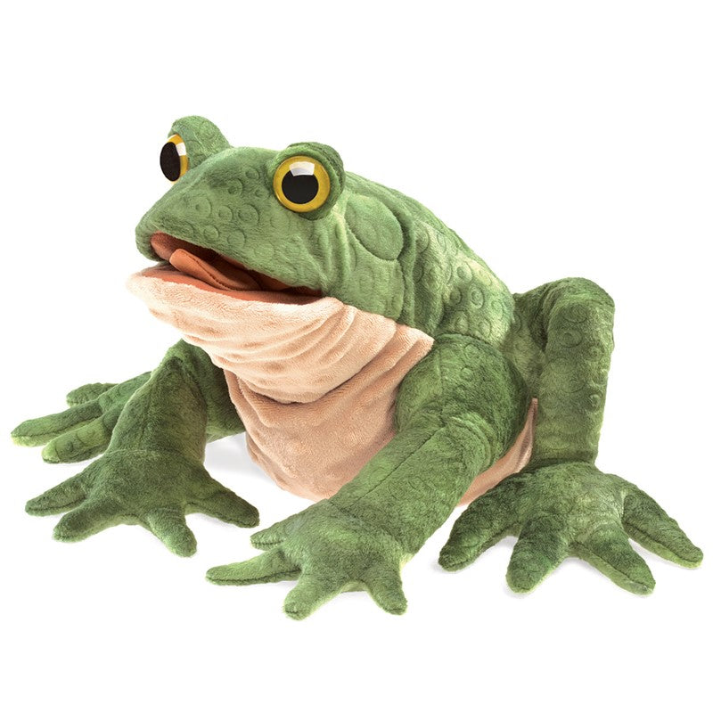 It's not easy being green, unless you're a cute Toad puppet! With a textured and warty plush body and wide open eyes, use your imagination to animate forelegs, mouth and even the tongue of this awesome amphibian! Size: 11" x 18" x 6" By Folkmanis puppets, founded in Watertown, MA. in 1976 Ages 3 +