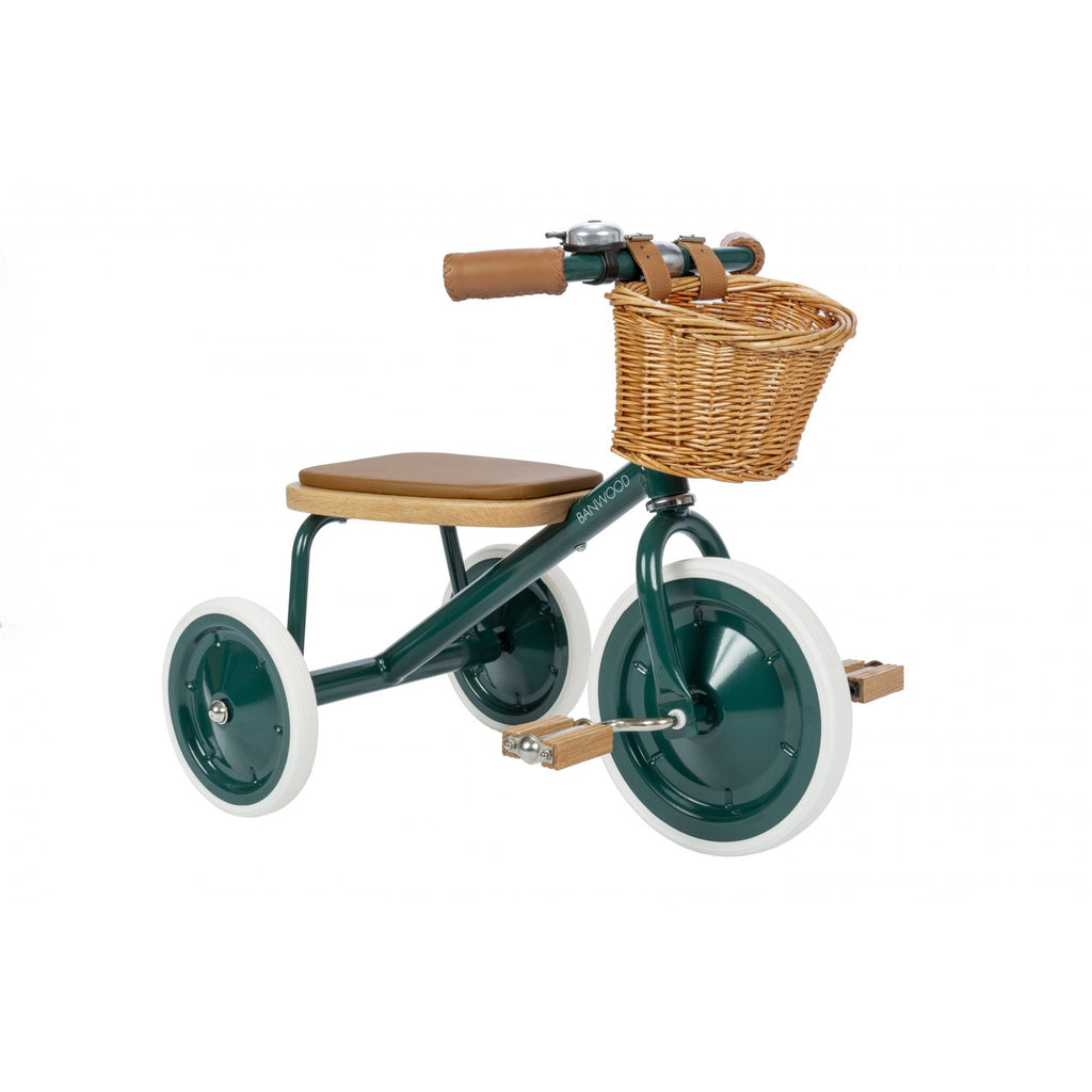 Perfect color for both girls and boys! The seat of this classic tricycle is made out of oak and is softly padded for a comfortable ride. The grips are made out of vegan leather, wooden oak pedals, a removable push handlebar in the back and a wicker basket in the front.  Weight: 5 kg · Age: 3–6 years. Seat height: 30 cm