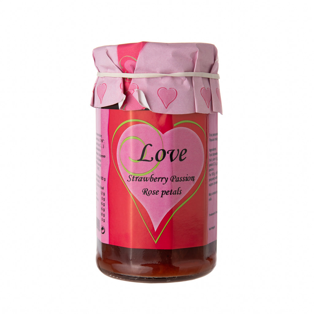 Add some extra love to your toast, pancakes or waffles, or to a decadent afternoon tea with this love-ely jam. Made with strawberries, passion fruit juice and rose petals, and adorned with pretty pink hearts, it's the sweetest way to show you care! Made in France 9.2oz