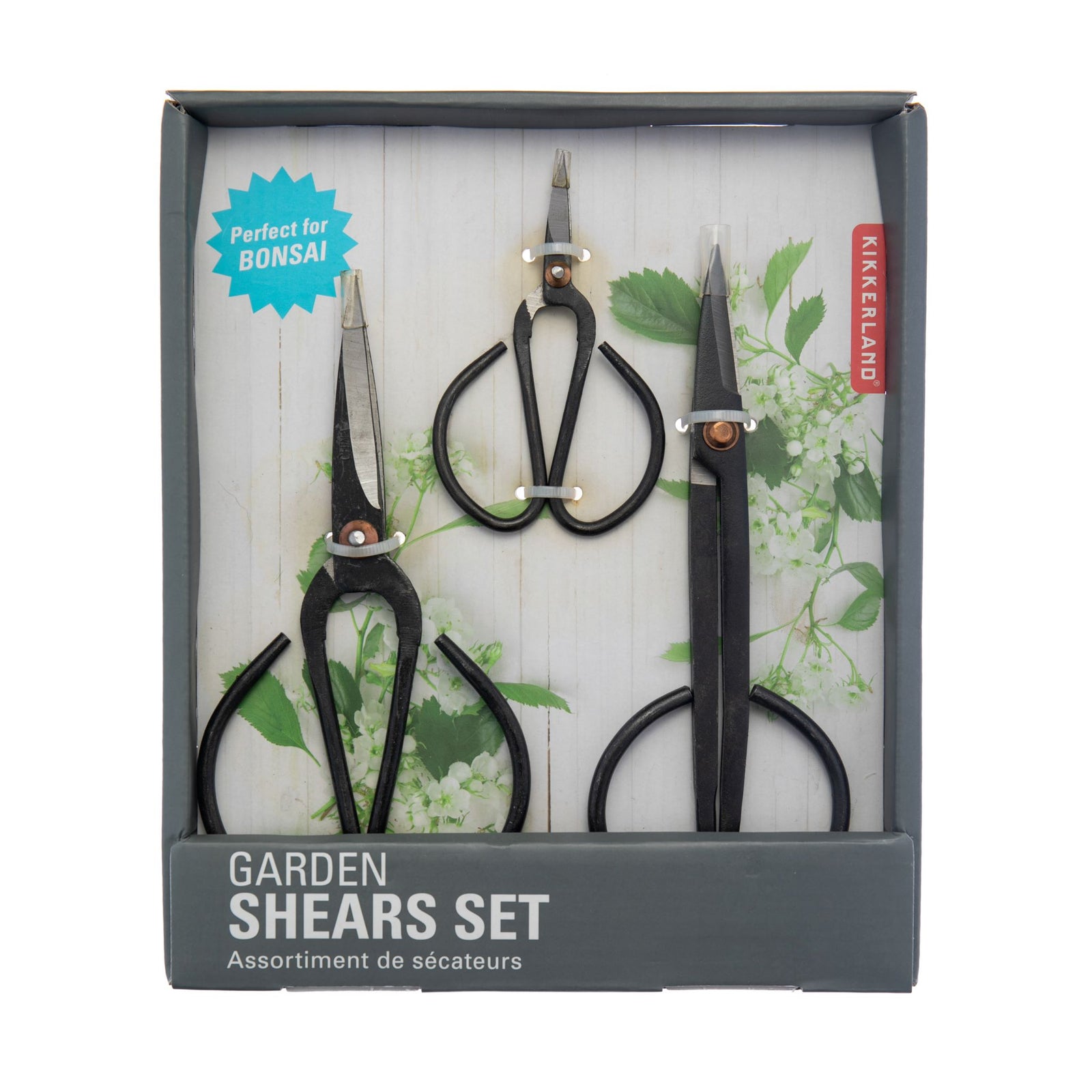 A set of three carbon steel garden scissors in varying sizes with black handles.