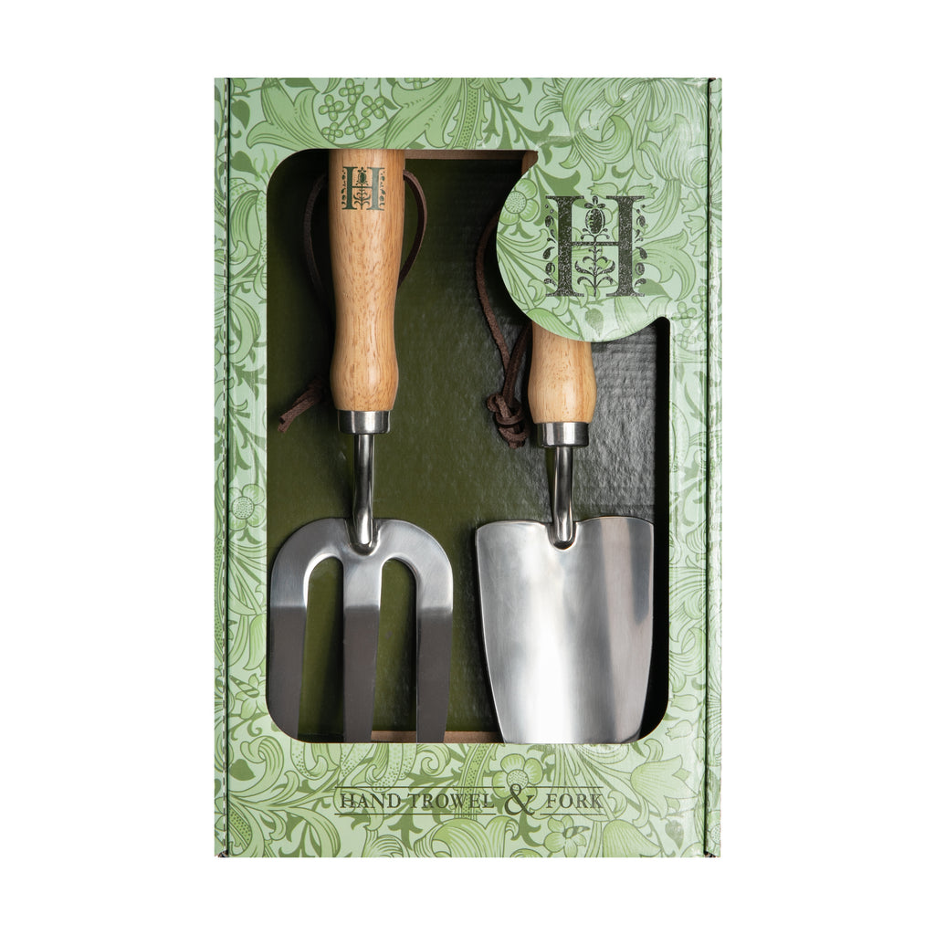We designed the perfect gift for a gardener! Spend your days in the garden feeling a little more inspired while using tools with our signature "H" logo. Stainless steel hand trowel and fork Rubberwood handles Huntington logo in green on each handle 8 1/2 x 13" decorated box.