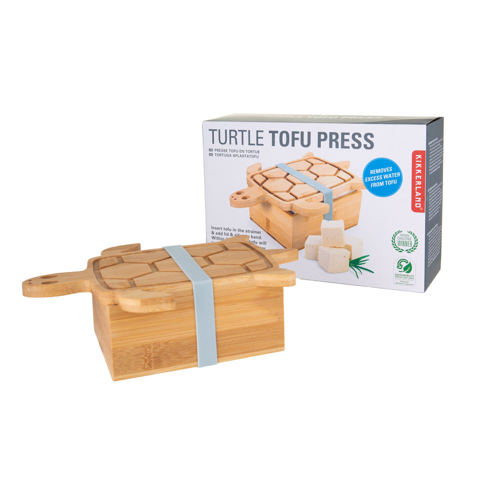 This terrific turtle shaped tofu press effortlessly removes excess water from your tofu. It is made from naturally antibacterial bamboo with a silicone band. Insert the tofu into the strainer, add the lid with the band and within 20 minutes, your tofu will be perfectly strained. Dishwasher safe. Size: 8.9" x 6" x 2.6"