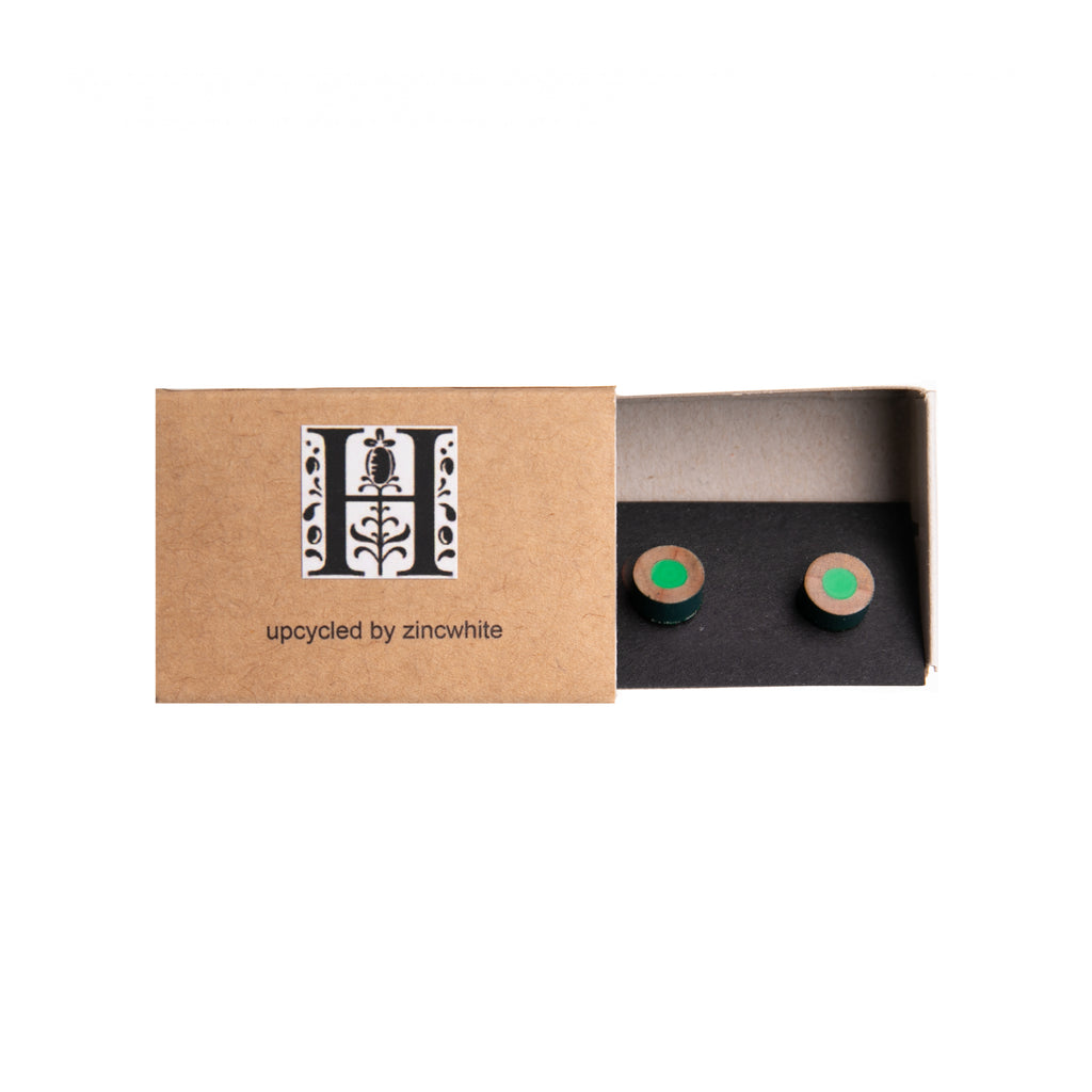 These conversation-piece stud earrings have been made using recycled green coloring pencils from the Derwent Pencil Factory in Cumbria, England. Sterling silver posts 8mm diameter Hand made - each pair is unique and may differ slightly from the photo