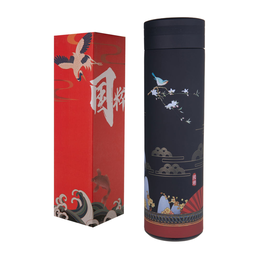 Japanese thermos flask with a traditional cherry blossom and fan design on a black background. Thermos is made from high quality stainless steel with a matte plastic coating which feels velvety to touch. Screw on cap with a waterproof seal, and removable tea infuser filter. Keeps drinks hot for 20 hours. 9" x 2.5".