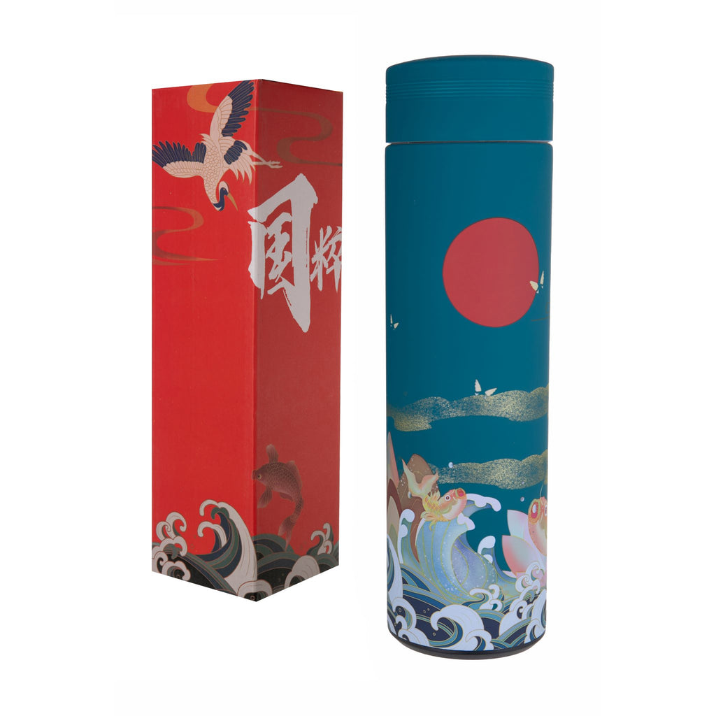 Japanese thermos flask with traditional wave and rising sun design on a teal blue background. Thermos is made from high quality stainless steel with a matte plastic coating which feels velvety to touch. Screw on cap with a waterproof seal, and removable tea infuser filter. Keeps drinks hot for up to 20 hours 9"X 2.5".