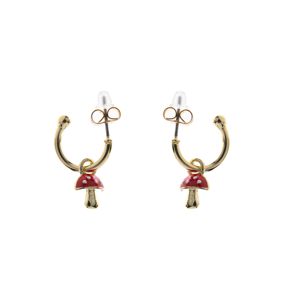Make your own magic with these mushroom charm earrings. Mini, hand-painted enameled mushrooms loop onto 14k gold dipped hoops to add a playful touch to any outfit. Enamelled charm earrings 14k gold dipped post hoops Hoop diameter approx: 1/2"